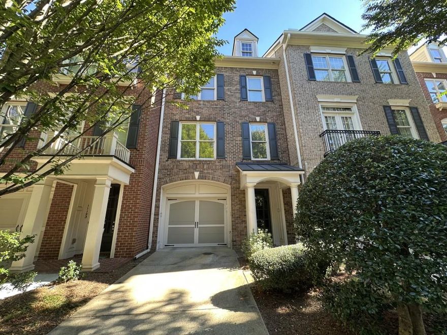 Unbeatable location! Just minutes from Alpharetta's most exciting dining, shopping, and entertainment, this stunning townhome puts you right in the heart of it all. Designed with style and comfort in mind, every detail shines from gleaming hardwood floors and elegant trim to custom lighting and thoughtfully desinged closets. Step inside through the welcoming foyer with direct access to the tandem garage. The main living level features a bright fireside family room with built-in shelving, a convenient office/study nook, and an open dining space that flows seamlessly into the kitchen. Your chef's kitchen is equipped with granite countertops, an island, stainless steel appliances,a gas range, and abundant cabinetry - perfect for everyday living or entertaining friends. Just off the kitchen, enjoy a private outdoor retreat for relaxing evenings. Upstairs, the primary suite offers a spacious sitting area framed by windows, a spa-inspired bath with dual vanities, a Jacuzzi tub, and a separate walk-in shower. A private secondary suite adds comfort and flexibility. Enjoy a low-maintenance lifestyle with incredible community amenities - pool, fitness center, clubhouse, and green space. Outdoor lovers will appreciate nearby Big Creek Greenway. Concerts, dining and shopping are just minutes away at Avalon, downtown Alpharetta and Ameris Amphitheatre. This isn't just a home - it's the lifestyle you've been waiting for.