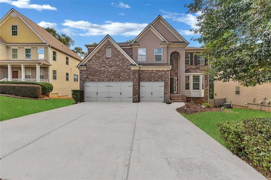 Welcome to 1913 Avondale Court — an elegant brick-front home nestled within the sought-after Heron Bay Golf Community. This impressive 4-bedroom, 4-bath residence offers over 4,000 square feet of finished living space plus a massive 2,000+ square foot unfinished basement, providing endless opportunities to expand, entertain, or create the retreat of your dreams.

From the moment you enter, you’re greeted by a two-story foyer soaring over 20 feet high, accented by upper windows that bathe the home in natural light. The open-concept living room features rich hardwood floors and flows seamlessly into a formal dining room framed by elegant columns and a coffered ceiling, creating a show-stopping space for hosting gatherings.

The chef-inspired kitchen blends warmth and sophistication with granite countertops, stainless steel appliances, a large center island, and abundant cabinetry—perfect for casual breakfasts or preparing holiday feasts. Upstairs, a spacious loft area offers flexibility for a second living room, media space, or play area.

The primary suite is truly a retreat, boasting a massive layout with a fireplace and private sitting area, tray ceilings, and an abundance of windows. The spa-like ensuite features a soaking tub, dual vanities, and a separate shower for the ultimate relaxation experience. Three additional bedrooms and well-appointed bathrooms provide comfort and style throughout.

The home also includes a 3-car garage, expansive driveway, and an unfinished basement that’s ready for your custom touch—home theater, gym, or guest suite potential.

Located in Heron Bay, residents enjoy resort-style amenities: a championship golf course, country club with restaurant and pro shop, multiple pools, tennis courts, lakeside walking trails, playgrounds, and a dog park. Conveniently close to shopping, dining, and the interstate, this home offers both luxury and lifestyle in one of Henry County’s most desirable communities.

Don’t miss the opportunity to make this exceptional property your own—schedule your private tour today and experience all that Heron Bay living has to offer.