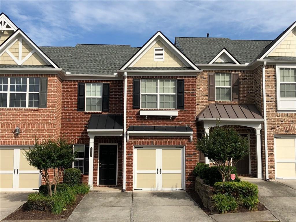 Beautiful 3 bedroom and 2.5 bath townhouse across from Johns Creek High School. This unit is meticulously maintained with great upgrades. Hardwood floor 1st floor, luxury vinyl plank 2nd floor (recently installed), no carpet in the house! Recent new paint throughout! Spacious kitchen with granite countertop and upgraded cabinets. Large master bedroom & bathroom with double vanity, separate tub/shower. Two additional bedrooms share one bathroom. On car garage, two car space driveway. Amazing community Lake, walk trail and playground. Top schools (Medlock Bridge Elementary, Autrey Mill Middle, Johns Creek High). Super convenient location. Walking distance to shopping, restaurants, and theater. Available for move-in from Aug. 26.