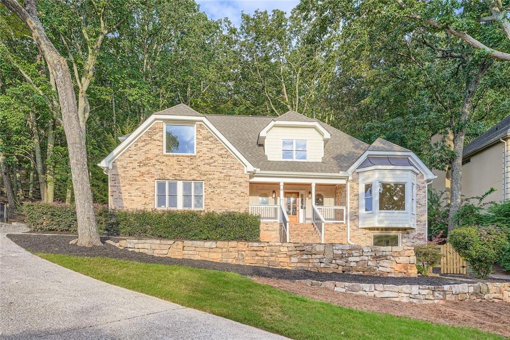 East Cobb – Highland Point! Lassiter HS district.
5BR/3.5BA w/new roof, remodeled kitchen w/quartz counters & walk-in pantry, hardwoods on main & upstairs hall, new carpet in BRs. Updated baths incl. luxe master w/double vanities, stand-alone tub & sep shower. Finished partial basement with remodeled bathroom. New recessed lighting, fixtures & outlets. Stone retaining wall, sodded & newly fenced backyard. Move-in ready!