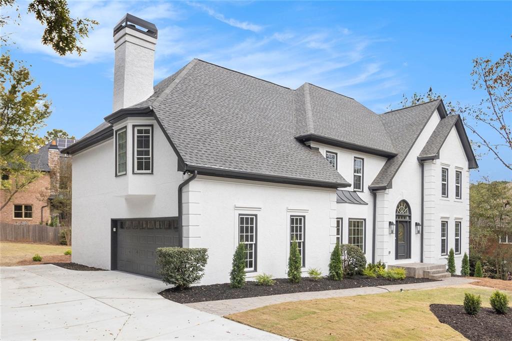 Completely Reimagined Family Luxury in Prime North Atlanta Suburbs.
Discover a completely renovated sanctuary at 2820 Harwick Drive, a perfect setting for your family's luxurious life in the Northern suburbs of Atlanta. Nestled within the desirable Spalding Green community, this home has been meticulously transformed, blending its generous 5,383 sq. ft. footprint with contemporary, high-end finishes. The dramatic foyer welcomes you with a gorgeous new chandelier.
Designed for the modern family, the spacious layout with completely NEW hardwood flooring on the main floor features a private guest room with an ensuite bathroom, an open concept living area with a grand fireplace designed with floor-to-ceiling premium stone, sky-high ceilings and open sight-lines, and a gourmet kitchen with brand new top-of-the-line appliances, a double oven, new cabinets, and new stone countertops featuring a waterfall island, ideal for both everyday connection and large-scale entertaining. The gourmet kitchen flows seamlessly into the sun-drenched breakfast area that leads to the renovated deck for an outdoor extension of the home. The completely finished, daylight basement with luxury vinyl flooring provides flexible uses including a children’s play area, home office, home gym, or media center. The basement even has a bar for entertaining guests and a full bath with a steam room.
Functionality meets elegance with 6 bedrooms and 5 full bathrooms, including a large stunning Primary Bedroom Suite with an attached sitting room and fireplace connecting to the primary bathroom with New custom his-and-her closets, and three additional oversized bedrooms upstairs, each with a private, renovated en-suite bath. Enjoy the benefits of a new home within an established neighborhood. A brand new HVAC system services the basement, and each floor operates on its own dedicated unit. The roof is only two years old. New flooring, fresh paint, a new kitchen, new custom bathrooms each with their own unique look, new electrical and plumbing fixtures throughout, and new landscaping with exterior painting for maximum curb appeal. The BRAND NEW brush finished driveway gives this home the cleanest look in the neighborhood.
This location offers unmatched convenience and a vibrant lifestyle. You are just minutes from top-tier schools (Dunwoody Springs, Sandy Springs, North Springs), convenient shopping destinations (Publix, Kroger, Target), and quick access to GA-400 and I-285. This turnkey property provides a peaceful, private environment while keeping you central to everything the northern Atlanta suburbs have to offer. Don't miss your chance to own one of Spalding Green's finest—schedule your private showing today.