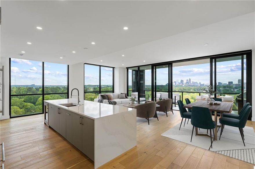 Experience elevated luxury living at The Dillon, Buckhead’s newest and most refined high-rise residence. This elegant three-bedroom plus den condominium offers a rare combination of sophisticated design, panoramic skyline views, and an amenity package unrivaled in Atlanta. Perched above the treetops, this residence captures sweeping vistas of the Midtown and Downtown skylines, as well as tranquil eastern sunrises through floor-to-ceiling windows and from the expansive 7’9” x 27’ covered terrace, complete with a built-in grill. Inside, wide-plank hardwood floors, custom automated shades, and an open yet intimate layout create a serene and polished living environment. Each of the three bedrooms is en-suite, complemented by a refined powder room and a separate den—ideal for a study, lounge, or media retreat. The primary suite is a true sanctuary, featuring a spa-inspired bath with dual vanities, a freestanding soaking tub, and a frameless walk-in shower. A generous laundry room adds to the home’s everyday functionality. Two dedicated parking spaces and a private storage unit are included with the residence. Residents of The Dillon are greeted by a grand motor court and enjoy valet and concierge service. The fourth-floor amenity deck is nothing short of extraordinary, offering a resort-style pool, pickleball court, private cabanas, firepit lounges, and a fenced dog park. Inside, “The Hub” provides a dynamic co-working environment, while a Resident’s Lounge, Golf Simulator Room, private Theater, and hidden Speakeasy offer inspired spaces to unwind and entertain. Several photos in this listing are virtually staged.