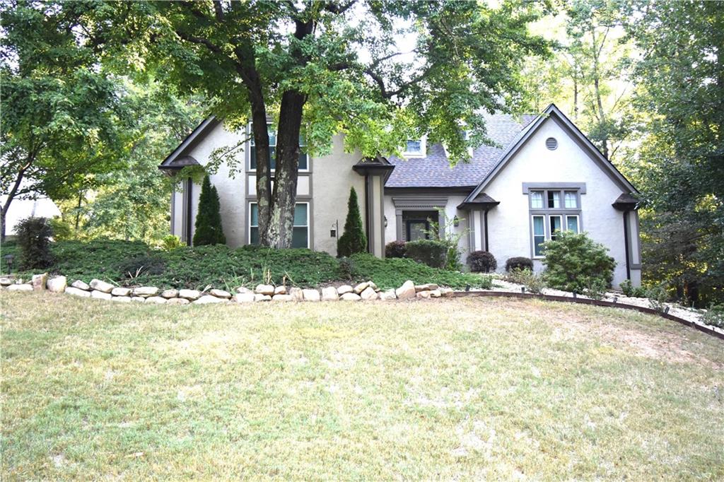 Don’t Miss This Stunning Home – Here Today, Gone Tomorrow! This beautiful home offers the perfect blend of elegance, comfort, and modern updates. Step inside to find gleaming hardwood floors and soaring ceilings that create a bright, open feel throughout. The spacious layout includes: A newly renovated kitchen with modern finishes, large main-level bedroom – ideal for an in-law suite, vaulted formal living room or study, elegant formal dining room,
great room with built-in bookshelves and a warm fireplace, sunroom – perfect for relaxing year-round, expansive primary suite with private en-suite bath, two large secondary bedrooms upstairs with a Jack-and-Jill bathroom, convenient upstairs laundry room and more... Recent updates include the renovated kitchen, tankless water heater, new roof (November 2024), and main-level HVAC system (2023) for added peace of mind. Located in a vibrant community with outstanding amenities: tennis courts, swimming pool, playground, clubhouse, and a picturesque lake – there's something here for everyone!