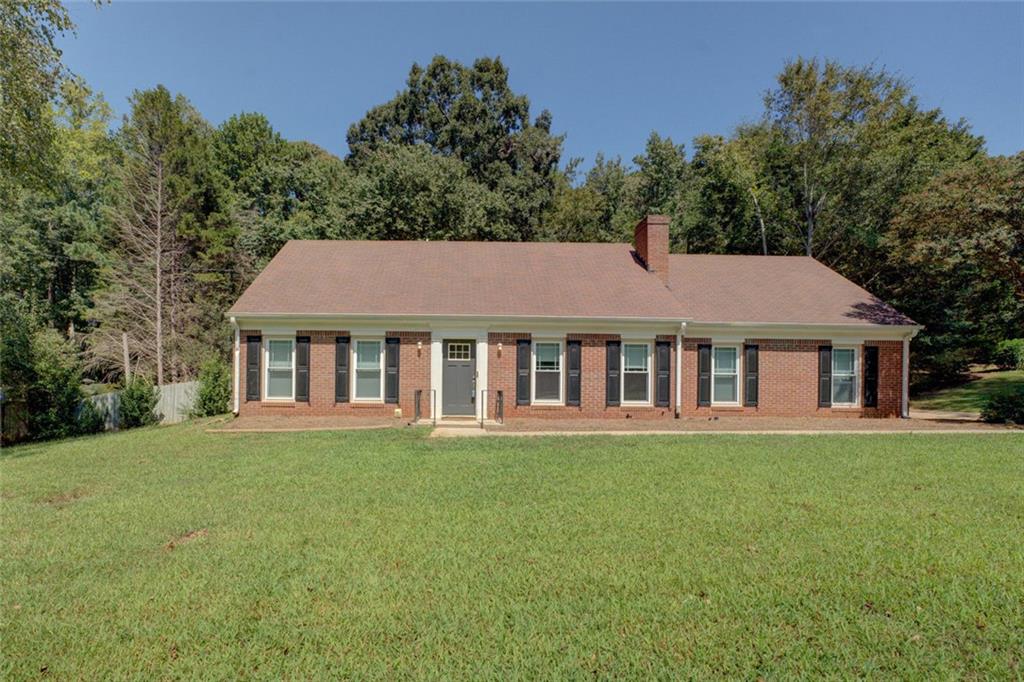 A classic brick ranch with modern updates, this home balances comfort, space, and convenience. The open living areas, updated primary suite, and expansive lot offer a lifestyle upgrade—without compromising on location or value. With a favorable listing price and no HOA, this property presents an exceptional opportunity for buyers seeking long-term satisfaction. Nestled in the Brandywine subdivision, this property enjoys a quiet, family-friendly environment just minutes from parks, shopping, and dining. Conyers lies about 24 miles east of downtown Atlanta, making urban connectivity accessible while maintaining suburban serenity.