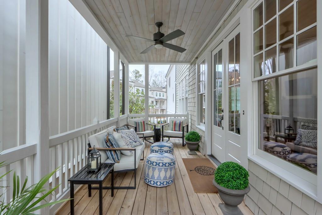 Now is the perfect opportunity to live in Voysey,  the premier community in Downtown Alpharetta. $100.000 PRICE IMPROVEMENT, PRICED WELL BELOW APPRAISAL!!   MOTIVATED SELLERS! Directly across from Brooke Street Park and City Center, this 3-bedroom, 3.5 bath home by award-winning builder,
Hedgewood Homes, is the epitome of luxury and convenience. Enter through the double glass front
doors into an open-concept main level. Beautifully painted cabinetry with marble countertops and SS appliances with a
separate scullery kitchen for overflow entertaining space. Walk-in pantry/office is tucked away just off
the kitchen and provides many options from storage to a work-from-home atmosphere. Large dining
space with views through the oversized windows onto the inviting covered front
porch. The living room is anchored by a beautiful custom fireplace and minimalist chandelier providing
a cozy atmosphere to relax. The lower level features a large flex room or 4th bedroom, full bath and
built-in cabinetry with a beverage refrigerator. A door leading outside to the private slate patio is
perfect for grilling and chilling in the beautiful Atlanta weather. You could never imagine that you’re
just steps from the bustling City Center and all the shops and restaurants not to mention entertainment,
Farmers Market and festivals throughout the year. The third level has a spacious Primary Suite with two
walk-in closets and a bathroom with a large shower and a double marble vanity. Two additional
bedrooms and full bath are perfect for guests. An added bonus is private parking for 2 cars and green space for your furry friends behind the house. Voysey is on the Alpha Loop that meanders the short
walk through the woods to Avalon, just 1 mile away! Come experience the best living in the heart of
downtown Alpharetta.