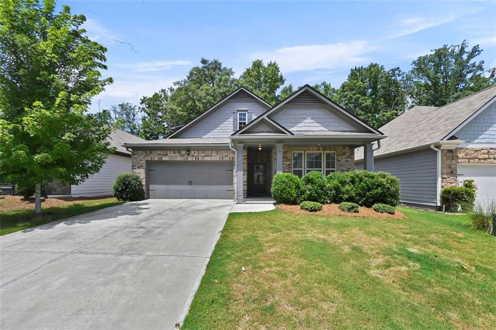 Welcome to 72 Wyevale Court, a beautifully maintained RANCH HOUSE, 4-bedroom, 3-bathroom home located in a peaceful, family-friendly neighborhood in the heart of Braselton. This charming residence offers a highly desirable layout with the master suite on the main level, accompanied by two additional bedrooms—perfect for easy, one-level living. The main living area features an open-concept design with abundant natural light, a well-appointed kitchen, and spacious common areas that make both daily living and entertaining a breeze.
Upstairs, you'll find a huge loft area that offers endless possibilities as a second living room, media space, or home office. Also on the upper level is a private bedroom with its own full bathroom, ideal for guests, teens, or a multi-generational living setup.
Step outside to enjoy your private backyard or head over to the neighborhood’s community pool for a refreshing dip and social time with neighbors.
Located just minutes from I-85, Downtown Braselton, hospitals, top-rated schools, shopping, and local dining hotspots, this home offers unbeatable convenience in a growing and vibrant area.
Don’t miss your chance to own this rare master-on-main layout with a bonus loft and community amenities. Schedule your private showing today and discover all that 72 Wyevale Court has to offer!