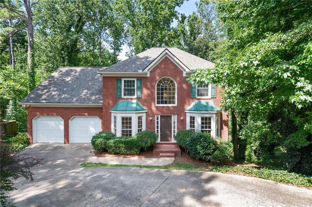 LOCATION! LOCATION! LOCATION! This 4 bedroom, 2.5 bath traditional style home with a full unfinished basement is part of the incredibly high demand Cobb County school district and convenient to I-75/I-575/HWY 92 and downtown Woodstock! See what this home has to offer! The spacious, open floor plan design is great for entertaining or simply keeping the family close together. The modernized kitchen features a gas stove cook-top with double ovens, all stainless appliances INCLUDING the fridge! The large, functional kitchen island with built-in dishwasher and sink features bar seating for an eat-in kitchen layout. The large family room is wide open to the kitchen and dining making for an awesome entertainment area! The traditional style of course features a formal dining room and formal living room. In addition to the 4 bedrooms on the upper level and two additional bathrooms this home has had some improvements lately. To name a few...a new water heater in April of 2025, and a new roof in April 2024. Last but not least, there is a Brita whole-house water filtration system (shown in basement photos) that can be negotiated to stay behind with the right conditions. *Ask for terms.