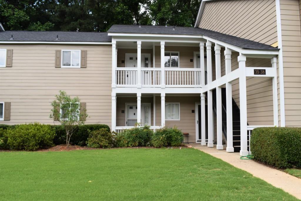 Spacious Updated condo in sought after Hillsdale Swim/Tennis Community in Smyrna! Conveniently located . This private home features 2 Bedrooms and 2 Baths, Double Vanities in Master Bath, Entire home Freshly Painted, remodeled kitchen with walk in pantry, hardwood floors, granite counters in bath, family room with fireplace, separate dining room, private screened porch with storage. All appliances remain for Tenant's use. Water and trash included in rent