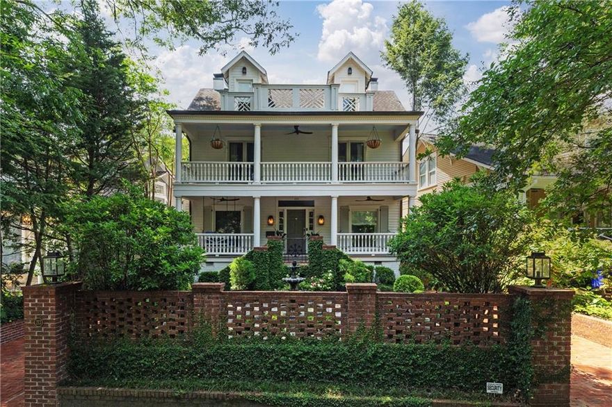 Nestled in one of Atlanta’s most sought-after neighborhoods, this classic 1920s Ansley Park home presents an air of Southern charm and elegance, framed by lush, mature greenery. The ivy-covered brick wall provides privacy and encloses the front courtyard with a tiered water fountain, adding a tranquil focal point. Step into the welcoming living room with timeless comfort, a space perfect for entertaining and intimate gatherings. From the living room, retreat into the study with floor-to-ceiling wood paneling, a coffered ceiling, beautiful arched window seat, and custom bookshelves to showcase a collection of literature and cherished artifacts. The spacious dining room flows effortlessly into the kitchen, breakfast nook, and cozy family room. Upstairs, discover an oversized primary suite with a generously sized walk-in closet and two additional well-appointed bedrooms and bathroom. Don’t miss the third-floor bonus spaces – perfect for a 4th bedroom and office or playroom. Hardwood floors gleam throughout, adding warmth and character to every room. The private outdoor space, enclosed by a classic red brick wall and verdant foliage, provides an area to unwind or create an intimate al fresco area under the pergola.