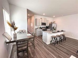 Welcome to The "Kaye" Plan. This Townhome offers 3 bedrooms and 2.5 baths. The upstairs area features 3 bedrooms and 2 bathrooms, while the main level has a half bath. The kitchen is equipped with 36' cabinets and a spacious island. The Owner's Bathroom Suite has a tiled shower with a fiberglass base. You can enjoy a maintenance-free lifestyle in these homes!! Home is USDA approved