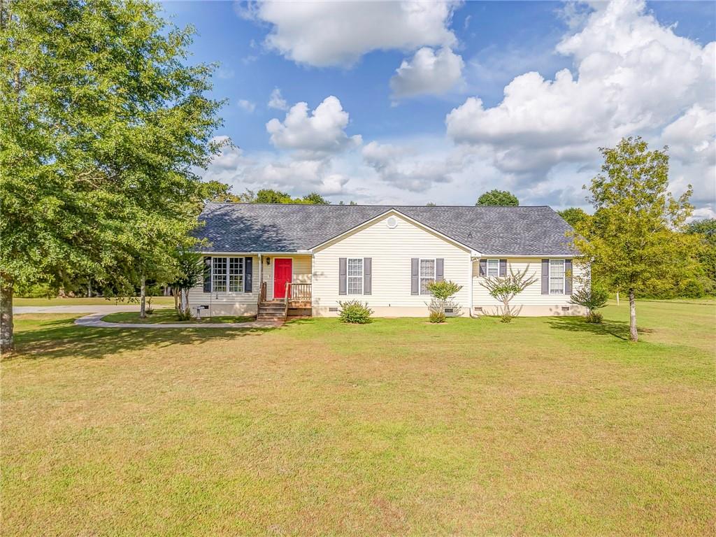 This charming country ranch sits on a spacious lot just a short drive from local shops, dining, and the conveniences of Cartersville and Rome. A large front yard offers a warm welcome, leading into an open-concept interior designed for comfort and easy living. The kitchen features abundant cabinet space, a central island perfect for meal prep or casual dining, and a seamless flow into the main living area ideal for gathering and entertaining.
Comfortable bedrooms provide peaceful retreats with natural light and room to relax. Step outside to a generously sized backyard complete with a deck, patio area, and an above-ground pool—perfect for enjoying warm Georgia days or hosting outdoor get-togethers. Whether you're looking to unwind or entertain, this inviting home offers the perfect blend of privacy, charm, and accessibility.