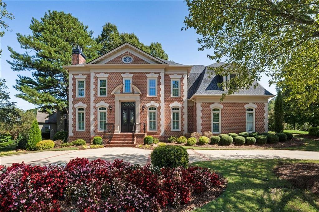 Welcome to this exceptional custom-built residence, showcasing superior craftsmanship and timeless design in the heart of East Cobb. Designed by Rick Green and situated within the sought-after Sope Creek Elementary district, this timeless brick Federal-style home offers just under 5,000 square feet of beautifully planned living space.
From here, you can walk to Sope Creek Elementary, the scenic Chattahoochee National Forest, and the popular Sope Creek Trails — blending everyday convenience with outdoor recreation at your doorstep.
Step inside to a dramatic two-story foyer, where abundant natural light, hardwood floors, and detailed millwork create a warm and elegant first impression. To one side, a handsome fireside study provides the perfect setting for a private office or library. To the other, a sophisticated formal dining room sets the stage for hosting memorable gatherings.
At the heart of the home, the chef’s kitchen is outfitted with premium appliances — including a Sub-Zero refrigerator and wine cooler, Bosch microwave, gas range, and dishwasher — making it as functional as it is stylish. An adjoining breakfast room and an open-concept fireside family room with custom built-ins create a comfortable flow for daily living.
The main level also offers a guest suite with full bath, plus a conveniently located powder room for guests. Upstairs, the owner’s retreat is a true sanctuary, complete with a newly renovated spa-like bath featuring dual vanities, a soaking tub, and a beautifully tiled shower. Three additional bedrooms and a versatile flex space complete the second level: one bedroom with en-suite bath and two bedrooms sharing a Jack-and-Jill design. Brand-new carpet throughout enhances the fresh, move-in-ready feel.
Additional highlights include a three-car garage — a two-car garage on the main and a a third drive-under one-car garage with circular driveway — as well as fresh interior and exterior paint.
Located in Sibley on Paper Mill, an exclusive swim/tennis community, this home combines neighborhood amenities with prime accessibility. Enjoy close proximity to The Battery, I-75 Express Lanes, Buckhead, Midtown, and many of Atlanta’s top private schools, all while benefiting from favorable Cobb County taxes.