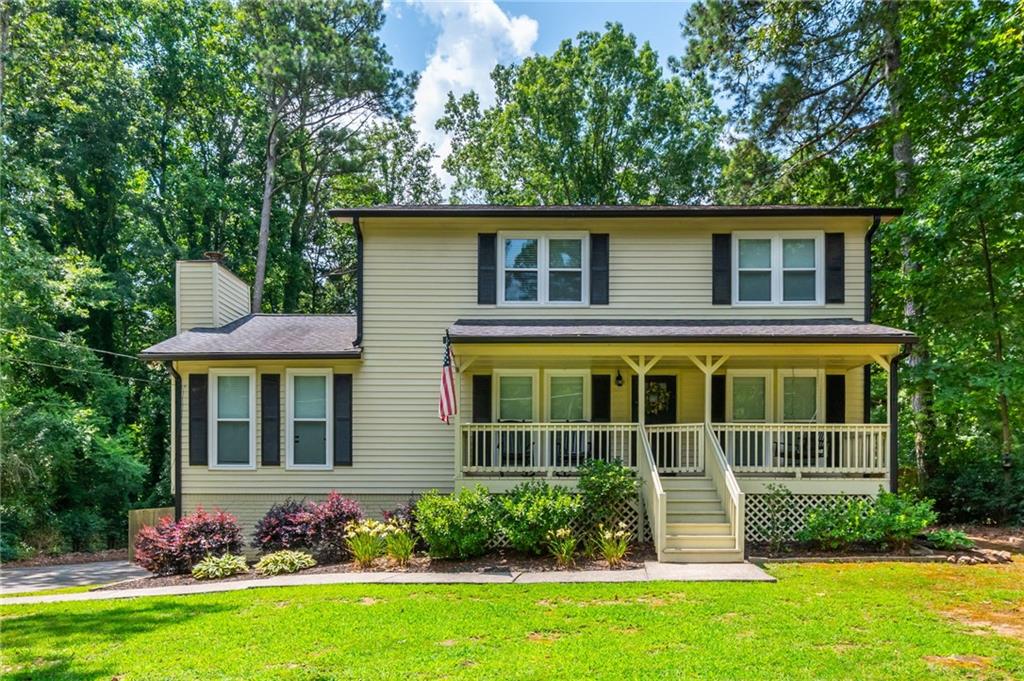 This beautifully maintained 2-story home offers 3 bedrooms and 2.5 baths with stylish features and functional spaces throughout. The main floor showcases gorgeous hardwood flooring and an open-concept layout that seamlessly connects the living and dining areas. The spacious kitchen includes a large island with breakfast bar seating, stone countertops, and classic white shaker cabinets—ideal for everyday living and entertaining.
The cozy living room features a gas fireplace and is filled with natural light, creating a warm and inviting atmosphere. Upstairs, the generous primary suite includes a spa-like en-suite bath complete with a double vanity and a sleek glass-enclosed walk-in shower.
A separate area off the garage provides the perfect space for a home gym, workshop, or hobby room.
Enjoy well-appointed outdoor living with a rocking chair front porch, a newer back deck, a paved patio, and a 30' x 30' artificial turf field—all within a fully fenced, private, and level backyard designed for both relaxation and recreation.
Located just minutes from Lake Allatoona’s Harbor Town Marina, Galts Ferry Beach, and Patriots Park, with easy access to I-75 and positioned between the vibrant communities of Downtown Acworth and Downtown Woodstock. This home offers comfort, convenience, and lifestyle—all in one package!