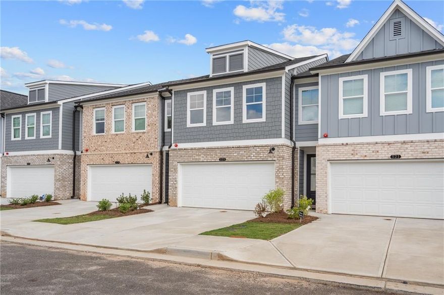 HOME OF THE WEEK – READY NOW! – Call today for exciting new deals! But hurry—only 4 homes left!

Welcome to the Washington I LOT 14 Townhome in the highly sought-after Rosehill Townhomes, Marietta. With 1,805 sqft, this modern, open-concept design features 3 bedrooms, 2.5 baths, and a 2-car garage. The main floor boasts a spacious kitchen complete with a generous pantry and mudroom, flowing seamlessly into the open living and dining areas with a beautiful electric fireplace, leading to a large patio—perfect for entertaining! Upstairs, discover an open loft and a well-appointed primary suite, accompanied by two additional bedrooms.

Nestled in one of Marietta’s top subdivisions, enjoy easy access to I-75, I-285, KSU, the Battery, and vibrant downtown Marietta. Unique features include gourmet kitchen options and some of the lowest HOA fees in the area, ensuring luxury living with added value! Benefit from community perks like a dog park and proximity to Marietta Square.

Don’t miss your chance to secure one of the last remaining homes in this popular community—schedule your visit today! Experience the perfect blend of comfort and tranquility before it’s too late.

Please note: Attached photos may depict upgrades or features not included in every home and are for illustrative purposes only. The final home may vary based on designer selections and site plans.