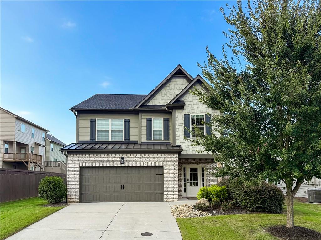 Welcome to this beautifully updated 3-bedroom, 2.5-bath home at 4215 Pembia Dr. in Cumming, GA, located just minutes from Hwy 400 and top-rated North Forsyth schools! Step inside to find thoughtful custom upgrades throughout, including a modern stair railing, designer light fixtures, and stunning accent details that set this home apart. Gorgeous LVP flooring flows throughout the home, adding both style and durability. The fireside family room creates a warm gathering space, while the kitchen impresses with white quartz countertops, custom-tiled island, premium appliances (including some KitchenAid), and abundant storage.
Upstairs, the renovated owner’s suite features a trey ceiling, a walk-in closet with custom organization, and a spa-inspired bath with double vanities and a large tiled shower. Secondary bedrooms are spacious and filled with natural light.
Enjoy peace of mind with a new roof, plus outdoor living at its best with a fenced backyard and an extended concrete patio—perfect for entertaining or relaxing evenings at home. Situated in a desirable swim community and close to Coal Mountain Park and the coming soon Coal Mountain Town Center, this home is stylish, move-in ready, and waiting for its new owner!
