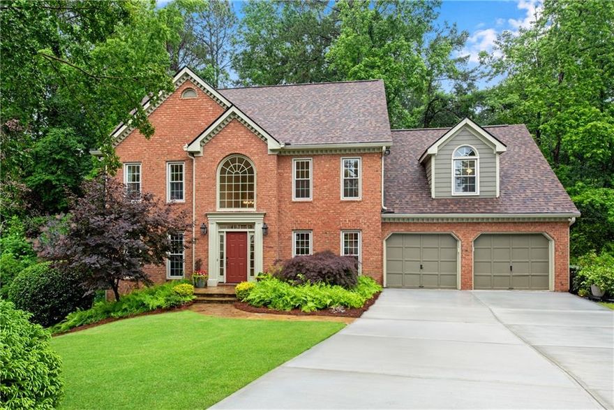 Welcome to this stunning five-bedroom, three-sided brick home, perfectly situated in the highly sought-after Dorset swim/tennis community in the heart of East Cobb. Blending classic elegance with everyday comfort, this beautifully crafted and well-maintained home is defined by its timeless architectural details with extensive trim and millwork throughout. Step into the grand two-story foyer, where abundant natural light streams through a large Palladian window, creating a bright and welcoming entrance. Just off the foyer, a spacious room offers flexible use as a main-level home office, music room, or playroom. The formal dining room, highlighted by an elegant chandelier, is the ideal setting for hosting unforgettable gatherings with family and friends. At the heart of the home is the beautifully, renovated gourmet kitchen—an entertainer’s and chef’s dream. It features a large, oversized center island with seating, custom white cabinetry with stylish hardware, handsome granite countertops, and a seamless flow into the inviting family room and incredible breakfast room. In the family room, you'll find a cozy brick fireplace flanked by custom built-ins and an oversized bay window that offers pleasing views of the lush backyard bringing the outside in. Adjacent to the kitchen is a sun-drenched breakfast room with soaring vaulted ceilings, surrounded by windows that flood the space with natural light creating the perfect spot for enjoyable family dinners and casual entertaining.  Opposing single panel French doors provide access to both an outdoor deck on one side of the breakfast room and a spacious screened porch on the other —enjoy the “tree house” feel of each of these elevated getaways, either perfect for morning coffee, an evening glass of wine, or year-round relaxation.  Also on the main level is a generously sized laundry/mudroom (with new washer and dryer included), a stylish half bath, and a convenient rear staircase. Upstairs, the primary suite boasts a tray ceiling and a luxurious spa bath featuring a large jacuzzi tub beneath a picture window, his and her vanities, a large walk-in shower, and a pair of custom walk-in closets flanking the tub. Three additional bedrooms provide comfort and versatility, and all have easy access to the hall bathroom.  The bonus room offers flexibility as a fifth bedroom, playroom, or second office.
The full daylight basement, with a wall of windows and two separate single panel French doors providing access to the backyard, has five framed-in rooms ready to be finished—ideal for a future bedroom, bathroom, game room, or home theater. Outside, the large, private backyard is fully fenced in and provides a lush and natural environment that has plenty of room for children or pet adventure and play.  It is also a birder’s paradise! This well-maintained, immaculate, move-in ready home offers a thoughtfully designed floor plan that seamlessly balances elegance, comfort, and practicality. A rare opportunity for refined yet comfortable living in one of East Cobb’s premier communities.
Recent Upgrades:
2025:
• Main level A/C and furnace units replaced.
• New carpet throughout upstairs.
• Kitchen cabinets refinished with new hardware.
• Gas stove cooktop.
• Interior painting.
• Driveway replaced.
• Main roof.
2024:
• Washer and dryer replaced and included.
2023:
• Solid pine hardwood floors on main level refinished.
• Screen porch roof, skylights, and all screens replaced.
• Upstairs A/C and furnace units replaced.
2022:
• Water heater and upstairs faucets replaced.
• Deck stairs, floor, and railings replaced.
2020:
• Bosch dishwasher installed.
2016:
• Main level and upstairs windows replaced with double panes.