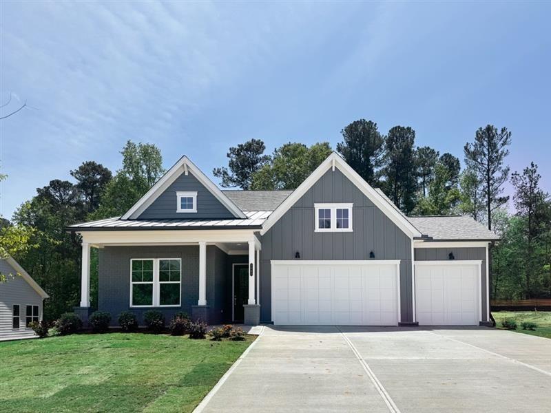 Welcome to Hillgrove Preserve, a thoughtfully designed new home community located near the border of Powder Springs and Marietta, brought to you by family-owned and operated Brock Built Homes—celebrating over 40 years of building quality homes across Atlanta. The Venice floor plan is a stunning 1.5-story ranch-style home that offers the perfect balance of luxurious main-level living with added space and flexibility upstairs. The main level showcases soaring 10-foot ceilings, a versatile flex room, a laundry area, and a bright sunroom perfect for morning coffee or evening gatherings. The chef-inspired kitchen features a large quartz island, upgraded cabinetry to the ceiling, a wall oven and microwave, gas cooktop with vented hood, pots and pans drawers, trash pullout, under-cabinet lighting, and a stylish backsplash. The open family room centers around a 42” direct vent fireplace for cozy nights in. The spacious owner’s suite is located on the main level and includes a luxury bath with quartz countertops and a zero-entry shower, creating a spa-like retreat. Upstairs, you'll find a spacious loft, a private bedroom with walk-in closet, and a full bath—perfect for guests or multi-generational living. Additional highlights include luxury vinyl plank flooring throughout the main living areas, white oak stair treads with metal balusters, a covered rear porch, a welcoming front porch, and a three-car garage. Hillgrove Preserve offers a peaceful setting close to shopping, dining, and major thoroughfares, all within the highly regarded Hillgrove High School district. Outdoor lovers will appreciate the area’s access to pools, golf courses, tennis and pickleball courts, hiking trails, horseback riding, and even BMX parks—providing year-round opportunities to stay active and connected. This home is move-in ready—call or visit today for a complete list of included features. Stock photos used. Agent is at Off-site location, please contact for appointment.