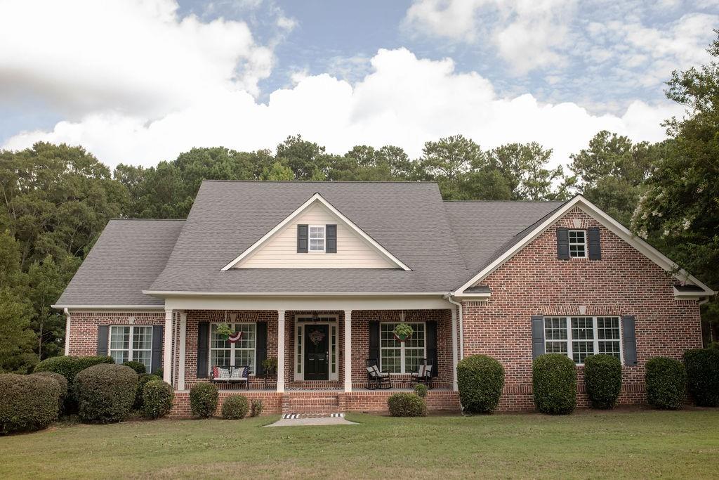Lovely Well Maintained Home located on 3+/- Acres, This All Brick Ranch home is just minutes to Downtown Monroe with lots of Shopping, Dining and local Activities. A Formal Dining Rm with Hardwood floors, Wide Base / Crown and Chair rail molding and a large inviting Great Room w/ Fireplace, Hardwood Flrs with entry to the large back deck awaits. The Kitchen boost lots of White Cabinets, Granite Countertops, Tiled Back Splash, Hardwood floors, Double Ovens and separate Cooktop. Large Breakfast area with Bay Window that overlooks the back deck is perfect for that first morning cup of coffee. The home has a large Master Ste with entry to the back deck and private Master Bathroom w/ Dbl Vanity, Tiled Flrs, Tiled Sep Shower, Garden Tub, and two Walk-In Closets. There are Three additional Bedrooms and Hall Bathroom to finish off the main level of this home. Upstairs is a large finished Bonus Rm / 5th Bedroom w/ Full Bath and 2 Closets. Extra's include Laundry Rm with Cabinets and Utility Sink, a Covered Front Porch, large Back Deck, Patio area, Oversized Garage and large level back yard. ** New Roof and Gutters