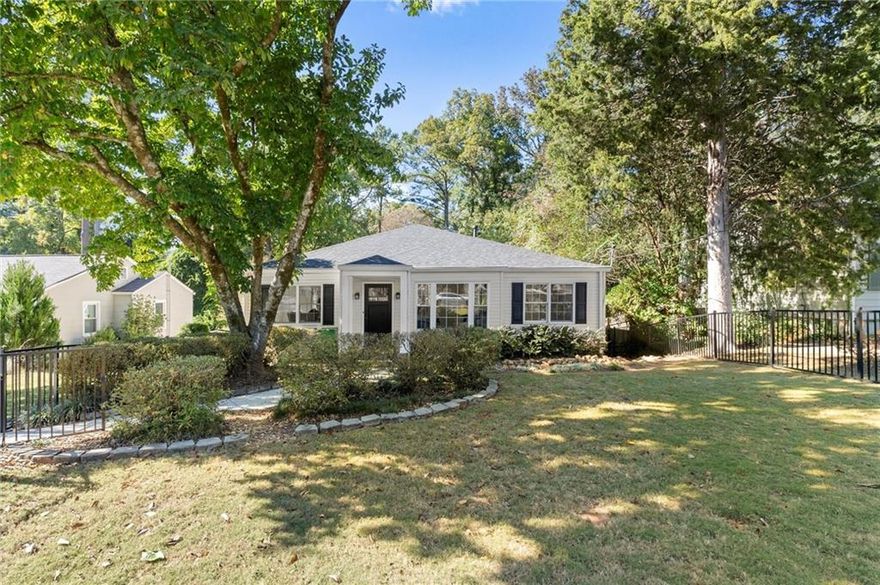 Welcome to this beautifully renovated and expanded two bedroom, two bathroom home in the highly sought-after Woodland Hills community! From the moment you arrive, you’ll be charmed by the inviting curb appeal and fenced-in front yard. Inside, enjoy the ease of spacious, one-level living filled with natural light and gorgeous hardwood floors throughout. The updated kitchen features an island, stylish gray cabinetry, a gas range, and opens seamlessly to the large fireside living room addition and breakfast area—perfect for entertaining or everyday living. The primary suite is a true retreat with a walk-in closet, dedicated laundry room, and an oversized bathroom—a rare find in Woodland Hills! The secondary bathroom has been recently renovated with a stunning, oversized shower. Step outside to relax or entertain on the deck overlooking the expansive, fenced backyard—ideal for gatherings, grilling, or simply enjoying a quiet evening. Don't miss the large, stand-up crawlspace for all your storage needs. Enjoy easy access to the new CHOA location, Emory, CDC, VA Highland restaurants, Morningside Nature Preserve, Decatur, Buckhead, Brookhaven, Midtown, Downtown, 85/GA400 access, Starbucks, parks, restaurants, and MORE! Woodland Hills neighborhood provides excellent highway access and multiple options for commutes to almost any part of town. Experience the perfect blend of comfort, convenience, and charm!