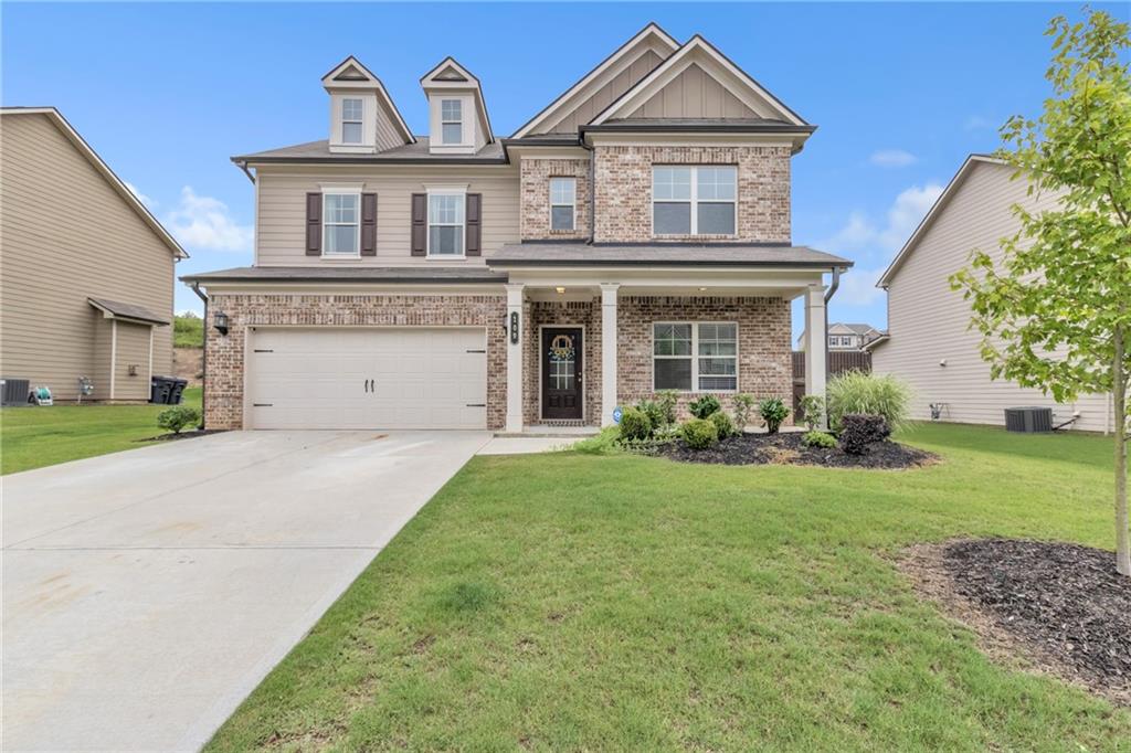 Located in one of Loganville’s most desirable communities, this beautiful 4-bedroom, 3-bath home offers a highly functional layout designed for comfort and style. The main level includes a guest suite with a private bath, an open-concept living area, and a modern kitchen with granite countertops, stainless steel appliances, and a large island. Upstairs features a spacious loft perfect for a second living room or office, a luxurious primary suite with a tray ceiling, a spa-like bathroom with double vanities, a walk-in shower, and a huge walk-in closet, along with two additional bedrooms and a full bath. Built in 2021 and in excellent condition, the home feels like nearly-new construction. Enjoy a fully fenced backyard with a covered patio ideal for gatherings. Conveniently located near top-rated schools, shopping, dining, parks, and with quick access to US Highway 78 and GA Highway 20. The community offers sidewalks, a swimming pool, and an affordable HOA. This home blends modern comfort, prime location, and a family-friendly neighborhood—ready for its next owner.
