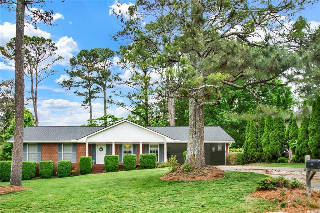 Photo 1 of 52 — 5597 Bob White Circle NW, Lilburn, GA 30047
