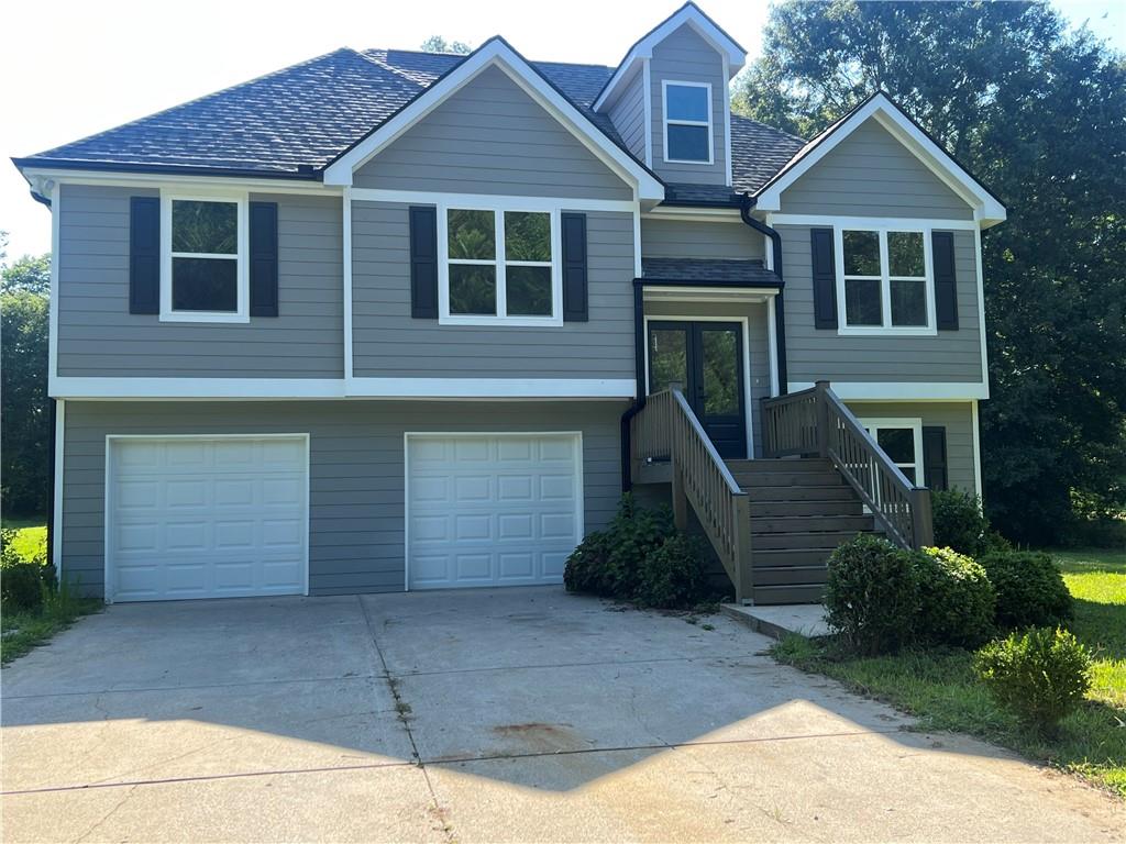 YOUR DREAM HOME AWAITS. MOVE-IN READY, FULLY RENOVATED & UPGRADED. THIS STUNNING 4 BEDROOMS & 3 BATHS SPLIT-FOYER HOME IS AN ABSOLUTE GEM, NESTLED ON A DESIRABLE SUBDIVISION IN A TRULY LOVELY NEIGHBORHOOD. ENJOY THE OVERSIZED LOT PERFECT FOR ENTERTAINING, PLAY OR SIMPLY RELAXING OUTDOORS. THIS HOME FEATURES A NEW LVP FLOORING, NEW LIGHTING AND NEW DOORS/WINDOWS, GIVING THE ENTIRE HOME A FRESH, MODERN FEEL, THE RENOVATED KITCHEN IS THE HEART OF THE HOME-FEATURING ELEGANT WHITE CABINETRY, TOP-TIER GRANITE COUNTERTOPS AND STAINLESS STEEL APPLIANCES. THE VAULTED LIVING ROOM WITH ITS COZY FIREPLACE OFFERS A WELCOMING SPOT TO UNWIND OR HOST. NEW ROOF, NEW WATER HEATER, NEW DECK, NEW AC UNIT, AND BEAUTIFULLY UPGRADED BATHROOMS WITH NEW VANITIES, SINKS, LIGHT FIXTURES, AND MORE. FRESHLY PAINTED INSIDE & OUT. SCHEDULE YOUR SHOWING TODAY. DON'T MISS THIS OPPORTUNITY.