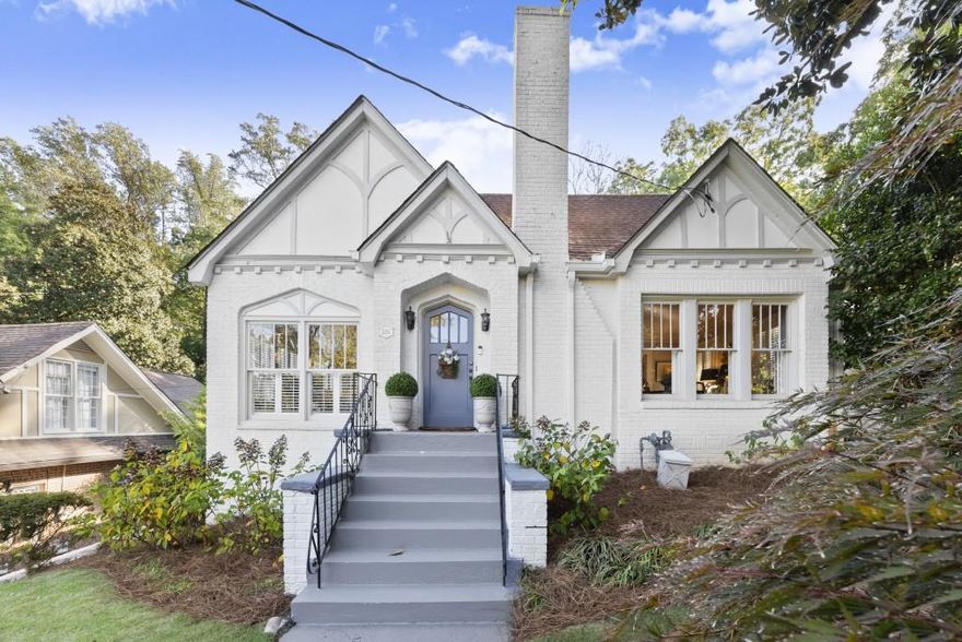 Live in the Heart of Virginia-Highland. Discover this light-filled 3-bedroom, 2-bath cottage in one of Atlanta's most beloved neighborhoods. Brimming with charm, this home features hardwood floors throughout and inviting spaces at every turn. The spacious living room with decorative fireplace opens to a sunny enclosed porch perfect for morning coffee or an afternoon read. A versatile flex room connects to the eat-in kitchen, leading to a large deck and fenced backyard ideal for entertaining. The primary suite includes a private bath, while two additional bedrooms share a beautifully updated marble bathroom. A permanent staircase to the attic offers excellent expansion potential. With ample parking and a convenient turnaround driveway, this home blends classic character with modern comfort. Perfectly positioned between Morningside, Emory/Druid Hills, and Midtown, this home captures the essence of Intown living with a highly accessible location to the vibrant intersection of N. Highland Avenue and Virginia Avenue, home to the area's favorite restaurants and boutiques.