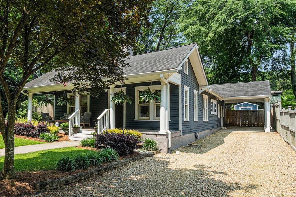 Welcome to this Picture-Perfect, Single-Level Bungalow nestled in the highly-sought after Cherokee Heights neighborhood, where Historic Charm meets Modern Style in one of Marietta's most iconic communities. Just a quick stroll to the Marietta Square, Kennestone Hospital, and all the Shops, Restaurants, and Parks that make this area so special, this home offers the perfect balance of Character and Convenience. From the moment you arrive, the Curb Appeal will draw you in with a welcoming Oversized Covered Front Porch made for slow mornings with coffee or relaxed evenings chatting with neighbors. Step inside, and you'll immediately feel the warmth and care that's gone into every inch of this lovingly updated 1939 home. You'll find Original Refinished Hardwoods throughout the main living spaces. The Open Floor Plan makes living and entertaining a breeze, with Natural Light streaming through every room and Craftsman Designer Touches at every turn. Four Decorative Fireplaces in the bedrooms and living spaces create a warm, inviting atmosphere, while thoughtful details like Custom Built-ins and Window Treatments, High-End Lighting, and Classic Penny Tile give this home a polished yet cozy vibe. At the heart of it all is the Gourmet Kitchen a true standout with Marble Countertops, Stainless Steel Appliances, Custom Cabinets with Wood Pull-out Shelving and Soft Close drawers, plus ample room for more than one cook in the kitchen. The Private Primary Suite is a true retreat, offering generous space and a Closet Big Enough For Two. The Spa-Like Bathroom features a Soaking Tub, Glass-Enclosed Shower, and Double Vanity the kind of space you'll actually look forward to winding down in. Out back, the Hardscaped Patio is perfect for Al Fresco Dining, lounging, or catching up with friends. The Large Fully Fenced Yard offers privacy and flexibility ideal for Dogs, Kids, or Gardening. Enjoy a glass of wine at the Firepit under the stars. All the Historic Details you love are still here, beautifully updated with today's most wanted finishes from Custom Millwork to High End Light Fixtures and classic touches that never go out of style. Zoned for Award-Winning West Side Elementary and Marietta High, and perfectly situated between Kennesaw Mountain and Marietta Square, you're surrounded by Hiking Trails, Boutique Shopping, Local Restaurants, and everything you need for a Vibrant Marietta Lifestyle. If you've been looking for something truly special, filled with character and move-in ready This Is The One.