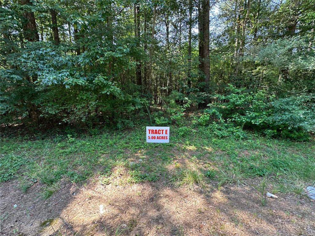 Welcome to your own private affordable paradise in Adairsville, Georgia! This stunning property boasts 5.00 acres of pristine land with 296' paved state road frontage, offering easy access to all the amenities of town while still providing a secluded and tranquil setting. Picture-perfect views abound on this lovely land parcel with multiple potential building sites that showcase the beauty of the surrounding landscape with mixed mature trees. Marvelous mountaintop views to the South and West offer endless opportunities for recreation and relaxation in the mixed timber forest. Whether you are looking to build your dream home, develop a family compound, watch the abundant wildlife, start a small farm, or simply enjoy the natural beauty of NW Georgia, this property has it all. Do not miss the chance to own a piece of paradise located near Adairsville. Barnsley Resort, Rome, Kingston, Cartersville, and Calhoun – schedule a showing today!