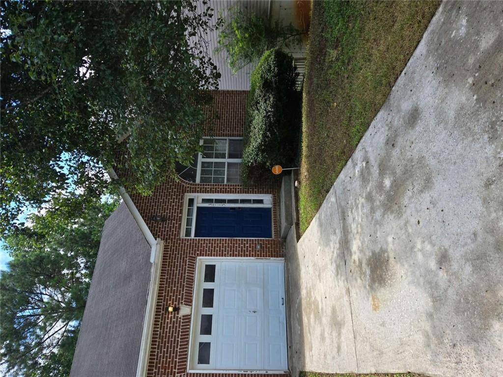 This beautiful 3-bedroom, 3-bath home offers the perfect mix of comfort, style, and a lake view. Inside, you'll find an open floor plan filled with natural light, a spacious kitchen with modern finishes, and a cozy living area designed for both relaxing nights and lively gatherings. 1 bedroom upstairs with 2 additional bedrooms downstairs that provide plenty of space. Out back, your own private escape awaits. The lake sits just beyond the yard, offering endless opportunities or even just enjoying the calming water. Imagine sipping your morning coffee on the patio while watching looking at the water. This isn't just a home-it's a lifestyle you'll never want to leave.
