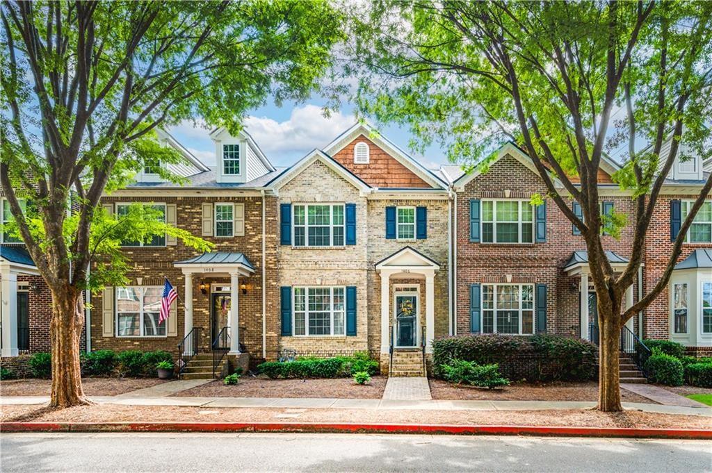 This breathtaking townhome that has been immaculately maintained with real hardwoods throughout the main, gorgeous eat-in kitchen with breakfast bar, white cabinets, granite countertops, gas cooking, stainless steel appliances (including a refrigerator), and pass through to the family room is available! GATED community of Kennesaw Battle with swimming pool and tree lined, private back deck to relax on and entertain on, and walk/bike to the trails of Kennesaw Mountain. There is not a better location than this! The Primary suite includes a newly tiled walk-in shower, dual vanities in the bathroom and walk-in closet along with trey ceilings. The laundry room is conveniently located upstairs where there are 2 additional bedrooms and an additional fill bath. The basement is FINISHED with a full bathroom and the bonus room can also be used as a 4th bedroom/multi-purpose room or office.