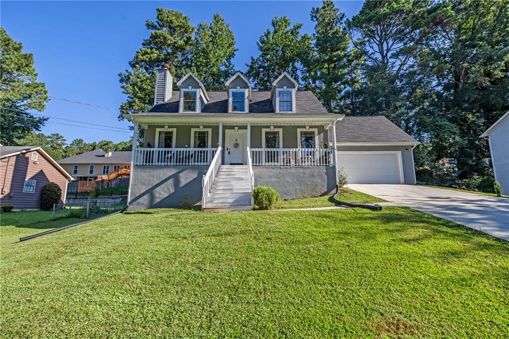 Welcome to 1001 Pine Ridge Drive in beautiful Stone Mountain, GA! This inviting 3-bedroom, 2.5-bath home sits on a spacious 0.30-acre lot and offers the perfect blend of comfort, functionality, and charm. Step inside to a bright family room with a cozy fireplace, ideal for relaxing evenings. The eat-in kitchen and separate dining area provide wonderful spaces for both everyday meals and special gatherings. The primary suite on the main level ensures convenience and privacy, while upstairs you’ll find two additional bedrooms with a Jack-and-Jill bath, making it ideal for family or guests. Enjoy outdoor living at its best with a fenced backyard and deck, perfect for entertaining or simply unwinding in your own private space.
