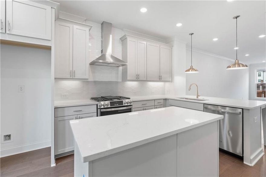 SUMMER OF SAVINGS !  ELEVATE YOUR LIFESTYLE. Come and see us , The Providence Group , Ecco park in Alpharetta ... and take advantage of our JUNE INCENTIVE ** $20,000  ANYWAY YOU WANT ** in our Barnsley I plan!  Come see this beautiful and cozy Barnsley I Floor Plan, featuring 2 Bedrooms and 2.5 Baths with beautiful views of trees and a small pond. The Front Entry is fenced and private with a covered Terrace patio, a nice sliding Glass Door and separate front door that opens up to a Flex/Media/Office Room. As you enter on the main living level you find an spacious Open Concept Family, Dining Area and Kitchen. The Kitchen has 42" upper full overlay cabinets with soft close doors & drawers and Crown Molding. The kitchen is also equipped with Calacatta Lavasa Quartz Countertops, Tile Backsplash, and top of the line GE Stainless Steel Appliances. At the 3rd level you will find the Primary Bedrooms with Tray Ceilings and a generous His and Hers Closet, a Primary Bathroom with Dual Vanity and a Walk In Shower. Second Bedroom is situated next to the Laundry Closet along with the Secondary Bath. One-car Garage with a Charger Station, extra storage space, and a driveway for an extra parking spot. Additional parking spaces can be found throughout the community. Walking distances to endless restaurants and shopping centers, dental, medical, bank and fitness facilities and just a short trip to coveted Avalon and Downtown Alpharetta areas.  The community features a landscaped wooded area, dog-friendly with pocket green spaces  and offers a vibrant vibe. Great opportunity to own in Alpharetta. This building will be ready for closing in Feb/March 2025. [The Barnsley I]