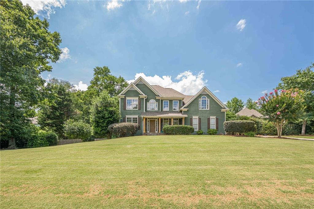 Amazing opportunity to own in highly desired Princeton Square neighborhood! Enjoy the large landscaped front yard from your rocking chair front porch, or entertain with a beautiful stone firepit and fenced in backyard! Sprawling two story foyer with formal living, dining, great room and open concept kitchen along with a half bath and laundry room on the main level. Brand new carpet upstairs with four oversized bedrooms including the massive owners suite with separate sitting area. Unfinished basement stubbed for an additional bathroom, ready to be finished to your liking. Walking distance to both elementary and middle schools and Haw creek park!