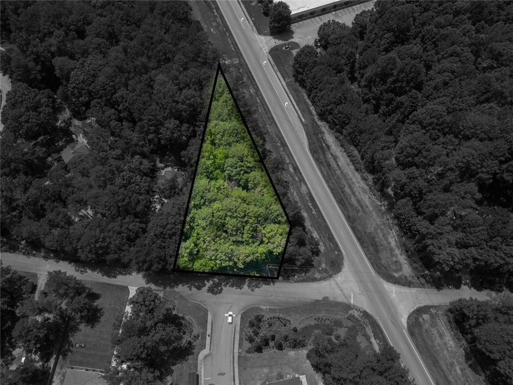 *Owner Financing* With approved terms. Lot for sale in Covington with road frontage on Bypass. .55acre. Bring your builder or ask to talk with one of ours. It may also be a land investment to possibly hold. *Verify and do your due diligence with City/County* No Disclosure - Investor Owned.