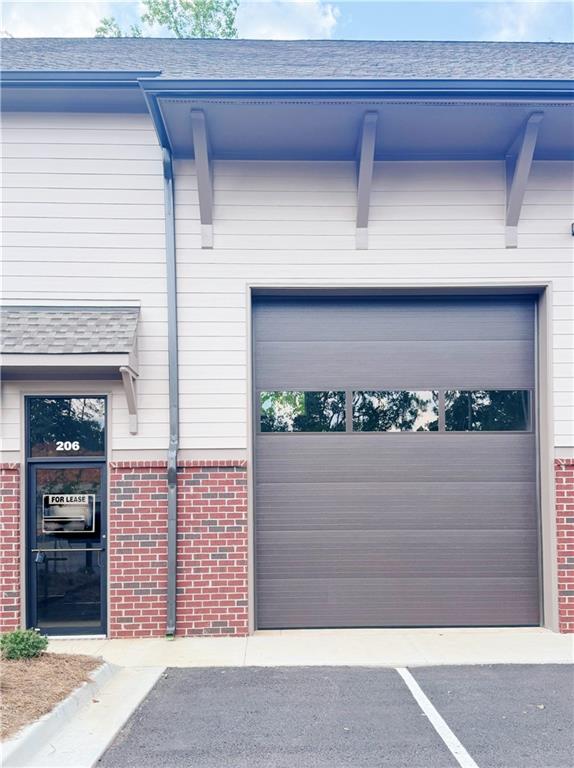 Welcome to your perfect industrial workspace in the heart of Forsyth County! This newly constructed small-
bay warehouse condo offers the ideal solution for light industrial, personal, or hobby use.
The unit features 20-foot clear ceilings, an oversized 12' x 14' insulated overhead door, and fully insulated walls
and ceilings for energy efficiency. Inside, you’ll find central HVAC, an ADA-compliant half bath with a
tankless water heater, high bay LED lighting, and convenient upgrades such as drywall finishes, a laundry
sink, interior hose bib, and multiple 110v outlets. With 1,250 square feet, this flexible space is well-suited
for business expansion, premium storage, or shop use. The property includes two assigned parking spaces
plus shared overflow within a professionally managed condominium community with protective covenants.
CONTACT OWNER - INFORMATION LISTED AT THE BOTTOM OF THIS PAGE.