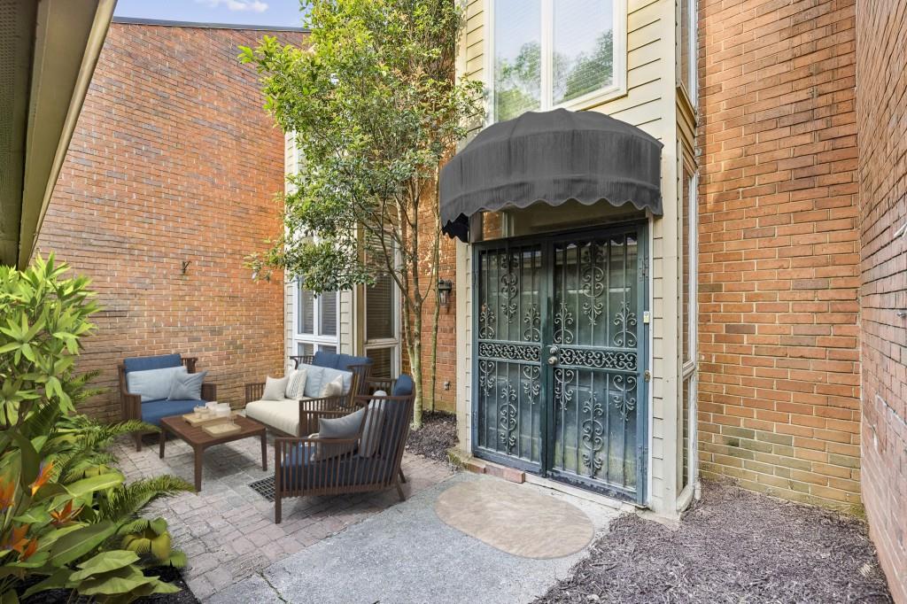 Welcome to this spacious and versatile Townhome nestled in the Private Willow Glen Community of Sandy Springs, just north of Buckhead and Inside the Perimeter. With Great Bones and Flexible Spaces, this home is perfect for a savvy buyer looking to customize the home to their liking. Step inside to find a Formal Living Room with Built-In Shelving and a Nearby Full Bathroom, ideal for a Home Office or cozy reading nook. Gleaming Hardwood Floors flow seamlessly into the Fireside Family Room and adjacent Dining Room, creating the perfect layout for daily living and entertaining. The well-appointed Kitchen impresses with Stainless Steel Appliances, Granite Countertops, a stylish Stone Backsplash, and ample cabinet and counter space. Upstairs, the Primary Suite is a true retreat with Dual Walk-In Closets and a Private Ensuite Bathroom featuring Double Vanities. Two additional bedrooms share a Hall Bathroom, ensuring comfort and privacy for all. The Lower Level is a Hidden Gem offering a large Bonus Room, a Full Bath, and existing Plumbing for a Bar Area giving this space potential for a guest suite, studio space, home gym, or additional living space. Enjoy the outdoors year round in the bright Sunroom with two sets of double doors leading out to a Private Patio oasis. A Two-Car Garage adds convenience and functionality. Willow Glen offers great community amenities including a Pool, Clubhouse, Tennis Courts, and a Basketball Court, a little something for everyone. Enjoy being Minutes to Buckhead, Perimeter, GA 400, Chastain Park, Northside Medical Complex, and premier Shopping, and Dining. This is the perfect blend of Location, Space, and Community!