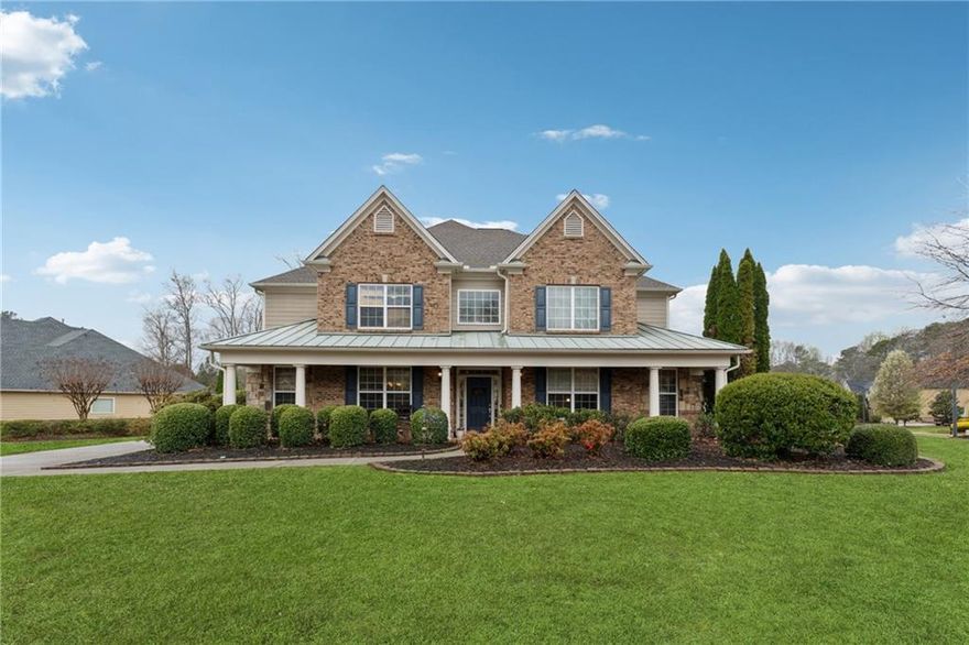 MUST SEE HOME WITH PRIMARY SUITE ON MAIN + IN-LAW/TEEN SUITE ON MAIN in this awesome move-in ready executive home located in the "very desirable Hillgrove High School district” and you'll want to make it your own!! This beautiful Home's features includes Large rocking chair front porch; Lots of gleaming hardwoods; Light-Filled 2 story Foyer with Office/Study to right once you enter the Foyer; Large vaulted 2-story fireside family room (Fireplace has Gas logs w/Gas switch) with open view to gourmet kitchen plus oversized windows offering an abundance of natural light;  Incredible kitchen a Chef would dream about, with open view to family room, spacious breakfast room, Custom granite countertops plus large granite Island, all stainless steel appliances including electric range with gas cook-top (Stainless Fridge Remains with Sale), Tons of cabinetry, and large walk-in pantry; Light-filled oversized Primary Suite on main level with sitting area, double tray ceiling, spacious luxury spa bath with large Jetted-Tub, Walk-in Shower, oversized His & Her's vanities, plus an oversized walk-in closet; The main level also has a spacious secondary en-suite guest bedroom ideal for a Teen or Mother-in-Law suite, with large full bath; On the upper level there are 2 oversized en-suite bedrooms with each having it's own full bath and large closet, plus there's a bonus room ideal for either a 5th bedroom, kids play room, office, theater, or workout room.  Large laundry room on main level  near kitchen.  Large private patio with privacy fence with plenty of room for family gatherings and Sunday cookout's; Large lot that's level front and back with easy care sod grass both front and back; Quiet and Beautiful well-maintained subdivision;   • Hot Water Heater Replaced 2022 • Dishwasher Replaced 2024 • A/C Coil and Condenser Replaced 2024  • Garbage Disposal Replaced 2024  * Taxes shown are based on senior discounted rate.