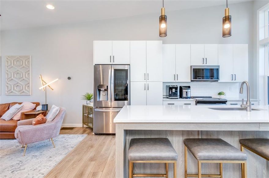 West Midtown Townhome for Rent – Modern Design, Smart Upgrades & Prime Location

Experience upscale urban living in this stunning contemporary townhome located in the heart of West Midtown Atlanta. Designed for those who crave modern luxury and convenience, this three-level residence features designer finishes, high-end upgrades, and an open-concept floor plan perfect for entertaining.

On the second level, you’ll find two spacious bedrooms. The primary suite offers a spa-like retreat with a tiled frameless glass shower, premium fixtures, and power shades. The secondary bedroom includes its own beautifully updated bathroom with a tiled shower/tub combo, matte black finishes, and dual access for guests. The laundry room is conveniently located on the same floor.

The third level delivers true open-concept living — with floor-to-ceiling windows, vaulted ceilings, and seamless flow from the kitchen to the living and dining spaces. The chef’s kitchen boasts quartz countertops, graphite cabinetry, stainless steel appliances, and a large island with seating for four. Step out onto the oversized patio, ideal for indoor/outdoor entertaining or enjoying an evening under the Atlanta skyline.

Smart home features include intelligent lighting, smart locks, garage openers, programmable thermostat, and power window shades. A two-car garage with secure entry and an extra storage room complete the package.

Located within walking distance of Westside Provisions District, you’re steps away from Atlanta’s best shopping, dining, and nightlife. With a future BeltLine connection nearby, this location is one of the most desirable in West Midtown.

Don’t miss your chance to rent this exceptional modern townhome in one of Atlanta’s most vibrant and rapidly growing luxury communities.