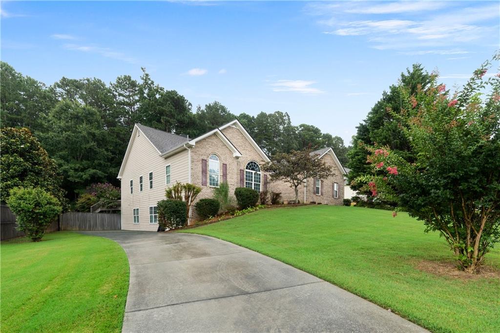Don't miss this 5 bedroom, 3 bath, ONE OWNER home! This beautifully maintained home is located in a cul-de-sac on a quiet, single street subdivision. Roof is 3 years old with architectural shingles, upstairs has new HVAC and heat pump, basement has 2 year old heat pump, septic pumped 2 years ago. Spacious upstairs boasts 4 bedrooms and 2 full baths. Kitchen opens to a breakfast room and a keeping room on one side and a dining room on the other. Primary bathroom has his and hers closets! The finished basement has its own private access with a private driveway! Basement has 1 bedroom and 1 bathroom with a living room, office, and a workout room! Space galore!