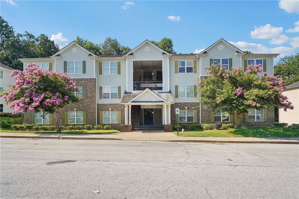 WALDROP PARK COMMUNITY | LOW-MAINTENANCE LIVING | CONVENIENT DECATUR LOCATION | 3 BEDROOMS | INVESTOR FRIENDLY | NEAR SHOPS, DINING & I-285 ACCESS! Welcome to 8302 Waldrop Place, a spacious and well-maintained 3 bedroom, 2 bathroom condo nestled in the popular Waldrop Park community in Decatur. This sought-after neighborhood offers a low-maintenance lifestyle, ample parking, and easy access to I-285, I-20, and downtown Atlanta—making your commute a breeze and everyday errands ultra-convenient. Step inside this top-floor unit to discover a bright, open layout with a spacious living room and dedicated dining area. The kitchen features plenty of cabinetry and counter space, perfect for meal prep or entertaining. The split-bedroom floor plan provides added privacy, ideal for roommates or multi-generational living. The oversized primary suite includes a walk-in closet and private bath, while the two additional bedrooms are generously sized and share a full hall bath. Whether you're a first-time buyer, downsizing, or looking to expand your investment portfolio, this unit checks all the boxes—no rental restrictions, making it a great opportunity for investors! Located minutes from South Dekalb Mall, local parks, restaurants, schools, and public transit, 8302 Waldrop Place offers both comfort and convenience in one of Decatur’s most accessible locations. Don’t miss out on this move-in-ready opportunity—schedule your private showing today!