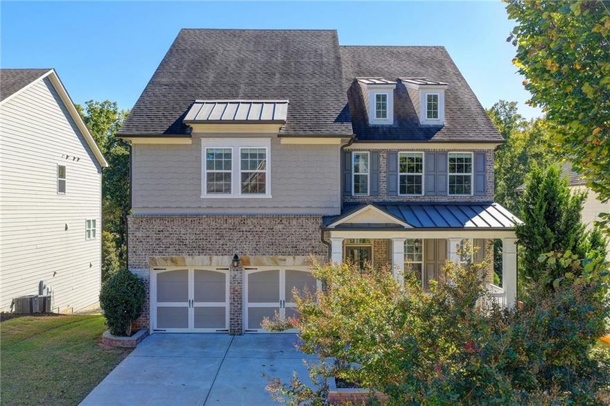 Welcome to 765 Grove Valley Drive — where refined charm meets family-friendly living. This stately residence commands your attention with its graceful façade, classic trim, and inviting front porch, all framed by well-manicured landscaping that hints at the care and attention within.Step inside, and you’re greeted by a luminous foyer that flows seamlessly into the heart of the home. Sunlight filters through generous windows, casting soft patterns on hardwood floors and highlighting the architectural detail that runs throughout — from crown moldings to transom windows and open archways that enhance sight-lines. The main living areas are designed to move with you: an elegant formal dining or sitting room, a cozy living space warmed by natural light (or perhaps a fireplace), and a chef’s-worthy kitchen that effortlessly blends beauty and utility. Imagine sleek countertops, abundant cabinetry, an island for gathering, and perhaps a windowed breakfast nook where morning light fuels your day. The primary suite is a quiet retreat: generous in size, with a tranquil ambiance, space for a reading nook or sitting area, and an en-suite bath that pampers with dual vanities, a soaking tub, separate glass shower, and a closet that balances style and functionality. Three (or more) secondary bedrooms continue the theme of comfort and light. Bathrooms echo the home’s refined style with quality finishes and thoughtful touches. If there’s an upper-level bonus room or loft, it adds flexibility — a playroom, media lounge, or office. Downstairs, the finished basement is a game changer. Picture it as a sprawling second living zone — ideal for a theater, recreation room, workout area, or guest suite. With full-height ceilings, defined spaces, and natural light (via egress windows or walk-out access), it’s as livable as the upper levels. Built-in storage, a wet bar, or a half/full bath here would only elevate its appeal. Finally, the outdoor space complements the home’s interior. A back patio, deck, or covered porch beckons for cookouts, evening conversations, or quiet mornings with coffee. Mature greenery, privacy screening, and tasteful hardscape or plantings bring the yard to life as an extension of the home. Every element — from the lighting to flow to the extra living space — feels intentional. This is more than a house; it’s a canvas for life’s moments — from daily routines to celebrations. Don’t miss your opportunity to make this home your own — schedule a tour and see how 765 Grove Valley blends elegance, flexibility, and modern comfort.