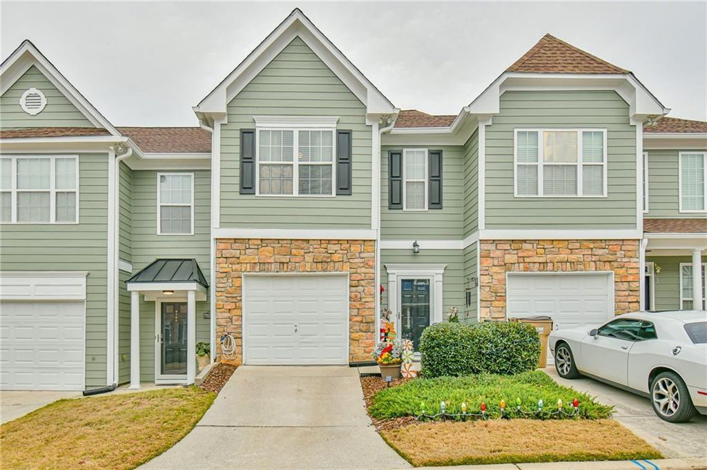 This Tide Water Cove townhome may be just what you are looking for! You’ll be walking distance away from lake access, Hideaway Bay Marina, Fish Tales Restaurant, park, playground, and more! Just minutes away from downtown Flowery Branch, I-985, and more dining and shopping. This home features three bedrooms, 2.5 baths, engineered hardwood flooring downstairs, with carpet upstairs, all of which is very clean and well maintained. The larger master suite features a vaulted ceiling and unique master bath plan, with separate shower and soaking tub. The kitchen features beautiful, stained cabinets, gas oven/cooktop and has a more separated feel with the pass-through opening to the living room. Washer/Dryer/Refrigerator included Within minutes of I985 , Close to everything
