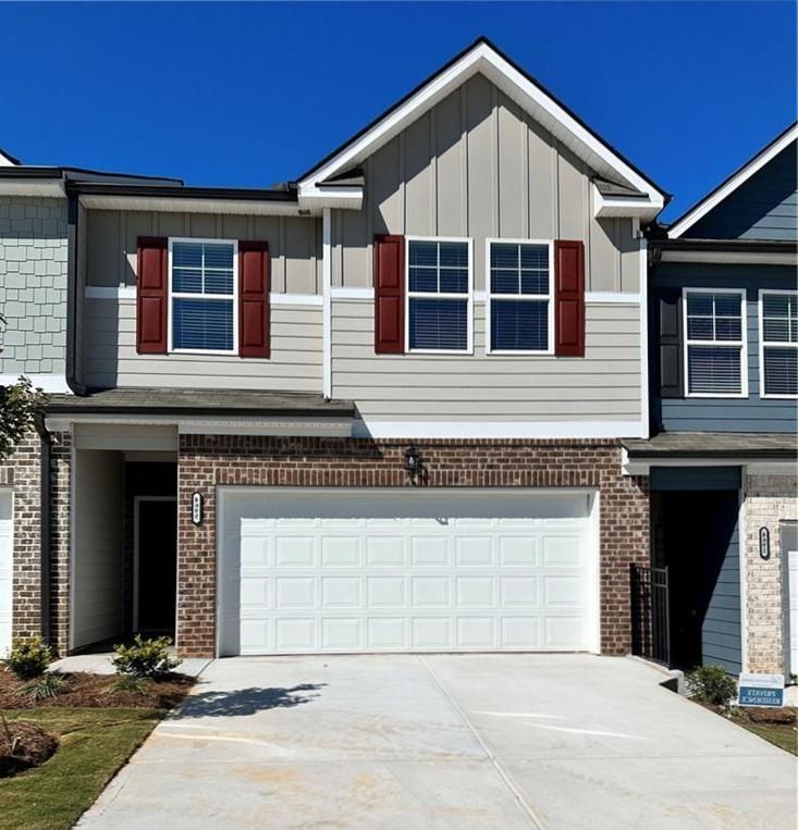 Luxury townhome in Oakwood available, minutes to downtown Gainesville, University of North Georgia - Gainesville campus, Lake Lanier Marinas and I-985. Newer townhouse, just two years old - and still feels like new. Bright open concept floor plan with plenty of upgrades throughout. Kitchen has granite countertops, stainless steel appliances, subway tile backsplash, and tall white cabinets, overlooking the living areas. Half bath and a two-car garage completes the main level. Spacious primary suite with trey ceilings and an oversized primary bath with double vanities and a huge walk-in closet. Two additional large bedrooms with an additional full bath. Available starting July 15, 2025!