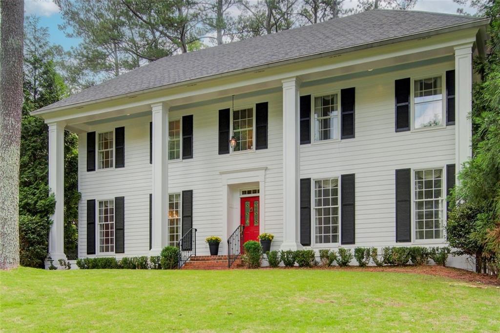 Pristine two story tradtional on quiet street in Buckhead's Morris Brandon Elementary school district. Charming four bedroom, three and a half bath with tons of character in popular Hanover West subdivision. Welcoming front porch draws you in to the two story foyer.  Dining and formal living room with built in bookshelves, nine foot ceilings and exquisite molding. The light filled kitchen boasts eat in breakfast area, plenty of cabinets, double ovens, stainless steel refrigerator, pantry, and mudroom. Fireside family room with double doors opens to patio and walk out back yard with peaceful water feature and zen garden. Homeowner was head of the Atlanta Botanical Garden's volunteer guild and it shows with extensive landscaping throughout with more than two dozen Japanese maples. Upstairs large primary suite, secondary bedrooms, and oversized laundry room used as office as well. Unfinished basement with workshop and loads of storage space. Neighborhood has one of the few intown swim/tennis clubs and playgrounds within walking distance. This is a great opportunity to get in a wonderful community with active social club surrounded by the best public and private schools and easy access to Midtown and Buckhead's shops and restaurants. Sellers have loved and lived here for more than forty years and this is a truly special home.