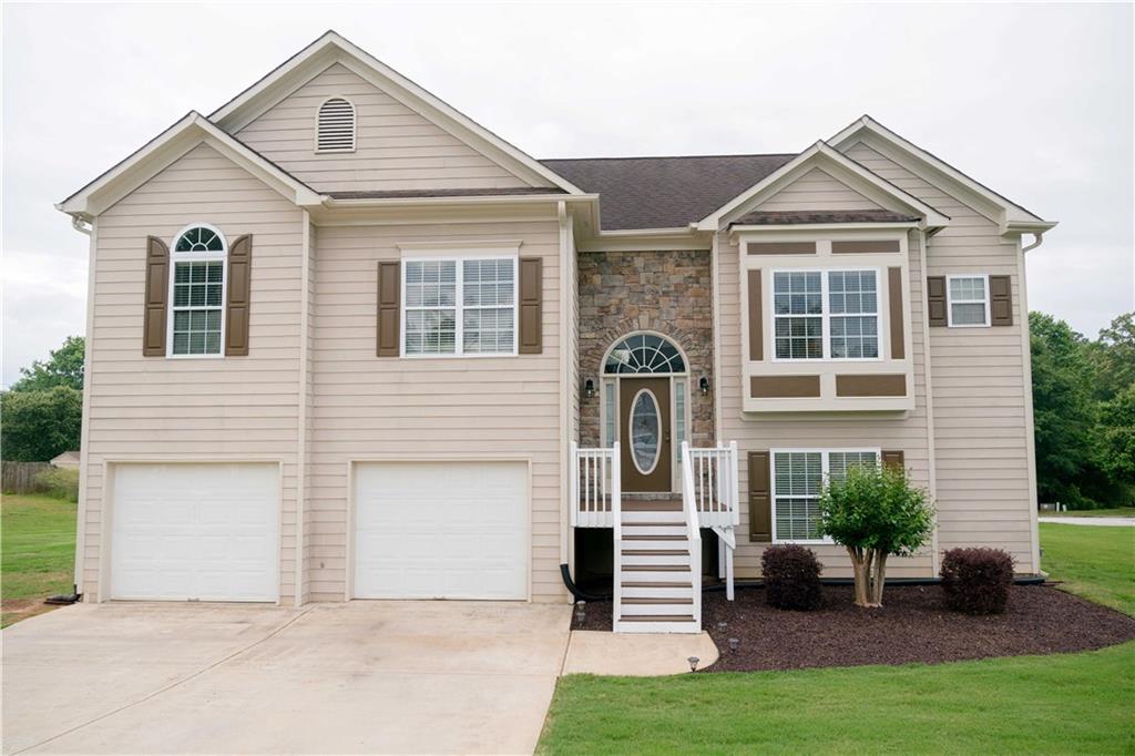 Beautifully maintained home on a corner lot, in lovely neighborhood close to schools and shopping. No HOA! This home offer 3 bedrooms and 2 full bathrooms on the main level with an additional 2 bedrooms, 1 full bathroom and bonus room in the basement. The vaulted ceilings, open concept and fireplace in the main living area make the home feel warm and inviting. The well thought out kitchen with an abundance of cabinets and counter space make cooking and preparing meals easy. Relax and unwind from the day in your oversized master bedroom, featuring tray ceilings and large windows. Getting ready for the day is easy in your master bathroom with separate shower, garden tub and double vanity; the walk-in closet has ample room for your wardrobe. The 2 additional bedrooms on the main level are generous in size. The addition of the 2 large bedrooms and full bathroom downstairs gives you plenty of space for everyone. Want a mancave, theater, game room or family room? You have endless possibilities with the bonus room downstairs! Grilling out and entertaining friends couldn't be easier with the large back deck right off the kitchen, with stairs that lead you down to your large level lot. The garage has plenty of room for parking and storage with an additional room off the back that would be perfect for a workout room, to store lawn care equipment or storage, it also has walk out entrance to the back yard. Schedule a showing today, it won't last long!