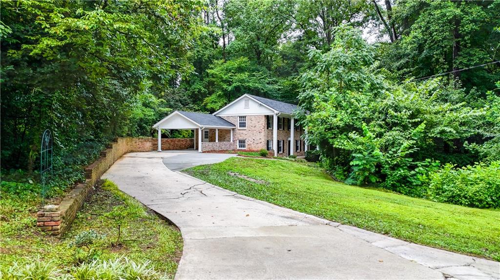Welcome to this beautifully maintained mid-century classic in the heart of thriving Embry Hills.
Situated on a private, tree-lined lot, this 4-sided brick colonial split-level ranch offers timeless charm with modern updates—truly move-in ready.
Step inside to find a spacious living room, a bright eat-in kitchen, and a generous family room with a skylight that fills the space with natural light. A guest bedroom and full bath on the main level provide ideal flexibility for visitors or a home office. Enjoy outdoor living on the cozy front porch or the private, shaded patio that feels like a retreat in the countryside.
The motivated seller has invested in numerous upgrades, including:
Fresh interior paint throughout
All-new light fixtures and LED lighting
New roof (2021)
New AC and furnace (2020)
New washing machine (2024) and microwave (2025)
New marble countertops and updated hardware in the kitchen
All priced to sell!
Enjoy unbeatable convenience—just minutes to Mercer University, shopping (including Macy’s), dining, and quick access to both I-285 and I-85, offering an easy commute in and out of Atlanta. You’ll also be near the popular Embry Hills Swim & Tennis Club, featuring volleyball courts and year-round community events.
Located in the highly sought-after Lakeside High School district, this home offers the perfect blend of comfort, location, and lifestyle.
