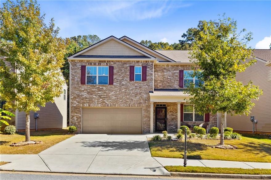 Freshly updated with brand-new interior paint and carpet throughout, this spacious home offers the largest floor plan in the Riggins Ridge community and is move-in ready! The bright open kitchen features stainless steel appliances, a large center island with breakfast bar, and abundant storage, flowing seamlessly into the family room with a cozy fireplace. A guest bedroom and full bath are located on the main level, ideal for visitors or multi-generational living. Upstairs includes four additional bedrooms, a laundry room, and a versatile loft perfect for a media room, play area, or home office. The oversized primary suite features a private bath with a double vanity and a spacious walk-in closet. The second upstairs bathroom also includes a double vanity, providing added comfort and convenience for family or guests. As part of the Riggins Ridge community, residents enjoy access to a playground, swimming pool, and tennis courts, creating a true neighborhood feel. Ideally situated with easy access to I-85, I-75, I-285, and South Fulton Parkway, this home is just minutes from Hartsfield-Jackson Atlanta International Airport, Chick-fil-A Headquarters, the Amazon Fulfillment Center, and the City of Atlanta. Enjoy close proximity to major employers, shopping, dining, sports, and more. This home offers space, style, and unbeatable value. Don’t miss your chance to make it yours!
