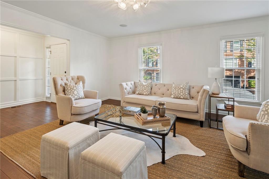 More Than a Townhome—It’s the Lifestyle You’ve Been Looking For
Imagine coming home to a place that feels like a single-family retreat, yet gives you the ease and flexibility of townhome living—right in the heart of Sandy Springs.
Welcome to a townhome where comfort meets convenience in one of the city’s most accessible yet peaceful communities. Set back in a quiet enclave just minutes from everything, this spacious three-level home offers over 2,500 square feet of beautifully updated living space—designed for real life.
Step inside to find fresh paint, rich hardwood floors, and a main level that invites both connection and calm. The oversized living room—with its fireplace and built-in wet bar—is made for gatherings, while the updated eat-in kitchen flows naturally into the dining room and den, perfect for everyday living or hosting a dinner party.
Upstairs, new carpet cushions each bedroom, creating cozy private retreats, while the updated bathrooms bring a touch of modern luxury. Need a flex space? The fully finished basement—with new carpet, a half bath, and its own entrance—currently being used as a home theater, but could become an office, gym, or even a 4th bedroom with minimal effort.
But it’s not just about the space—it’s about the lifestyle. You’re just minutes from Costco, Home Depot, and Perimeter Mall, plus top corporate campuses like State Farm, Cox, and AIG. With quick access to I-285 and GA-400, getting around the city is easy. And for families, it's zoned for Riverwood International Charter High School, offering the full IB Diploma Program.
Whether you're upsizing, downsizing, or relocating, 504 Dunwoody Chace offers a rare combination: space to stretch out, a location that connects, and low-maintenance living that keeps up with your life.
Complex allows long term rentals and rental cap has not been met.