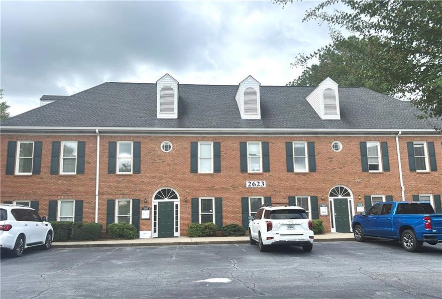 BLDG 2623  UNIT 200   Rent includes Gas, Electric, Water and CAM!  How can you beat that! Very sharp upper level office space. Four oversized offices with closets and a restroom with separate handwashing area. Perfect for any number of businesses! Building 2623 is located across from Sprayberry High School in the Williamscraft Office Park. Beautiful setting and very convenient. Restaurants are within walking distance and markets, gyms and shops are located very near.  Easy access to I-75, I-575, Town Center, Marietta Square and Wellstar. Local shopping favorites are also nearby; Publix, Target, Home Depot and more!  The interior of this office space is one you will be proud to bring your customers/clients in.  Carpet is fresh, walls are neutral light grey and the offices are bright. Don't miss this prime opportunity.